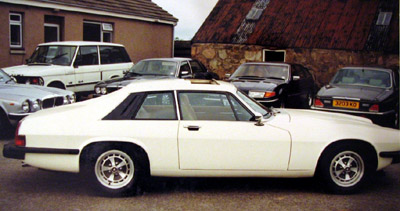 Side shot of the white Jaguar XJS used in The Return of The Saint